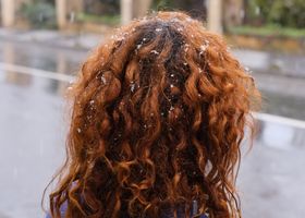 Muted blue portrait in winter rain